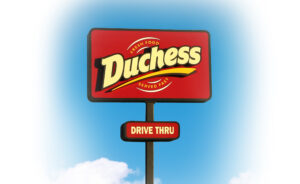 Duchess restaurant drive thru sign with blue sky and a few clouds